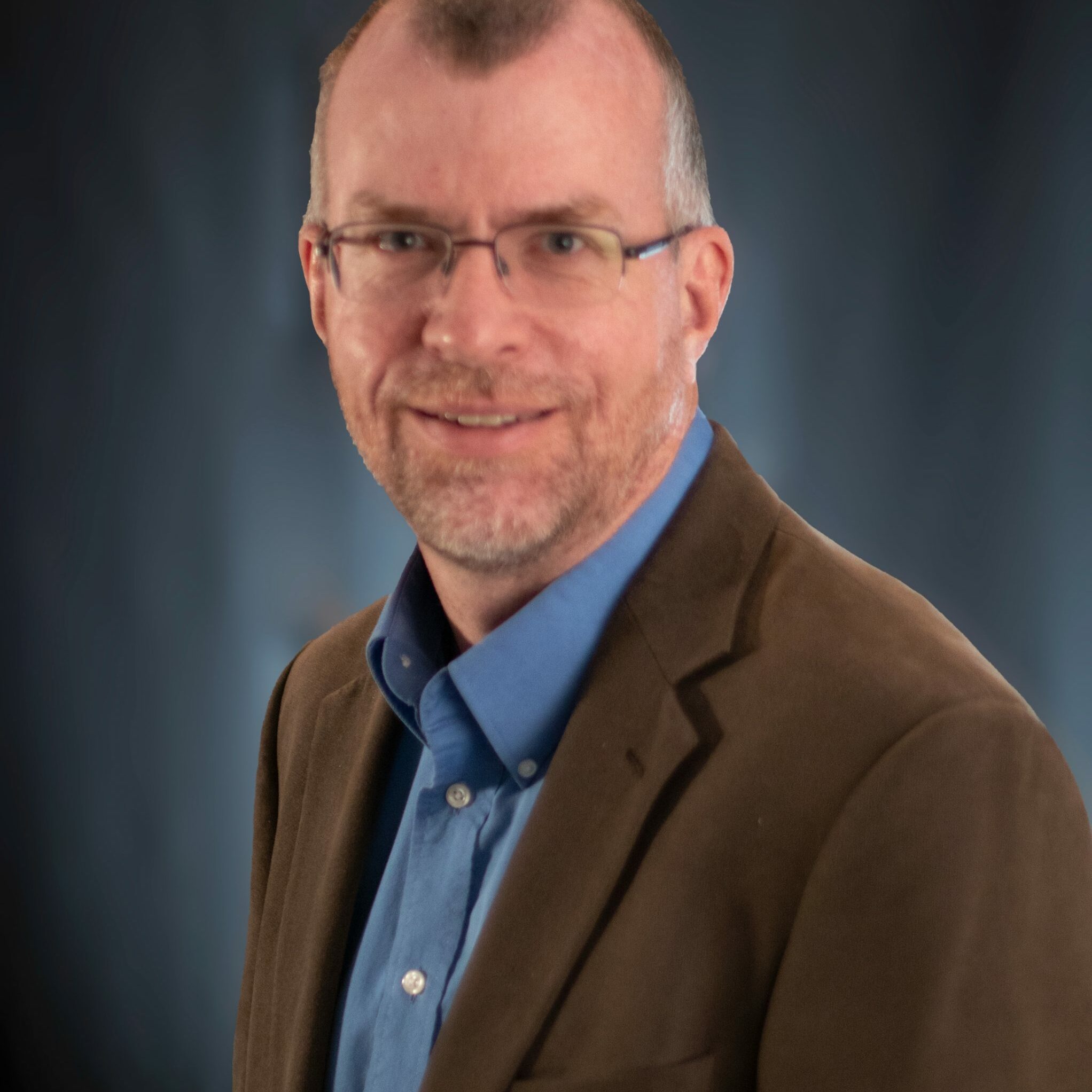Mel BL - 2161 x 2707 Headshot of staff member